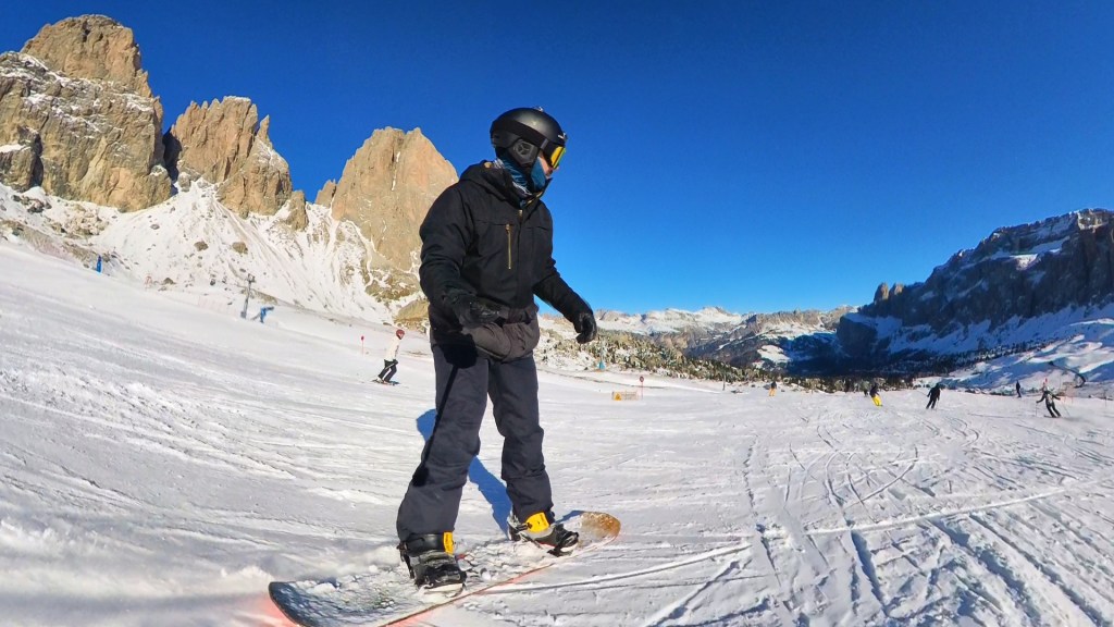 Snowboarding down the Passo Sella
