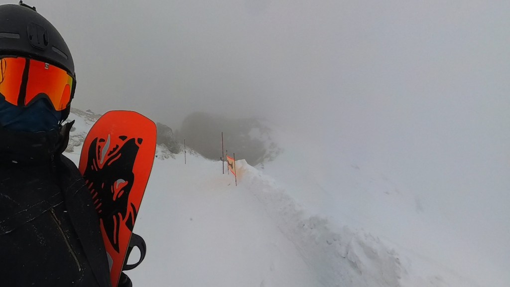 Fog in a snow-covered Marmolada.